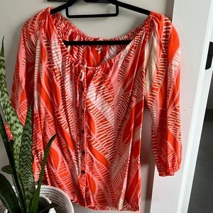 Manuheali’i blouse size small.